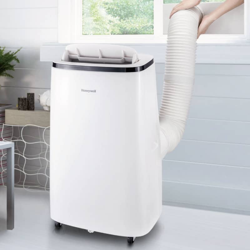 Honeywell-Contempo-Portable-Air-Conditioner-Dehumidifier-And-Fan-HJ2CESWK8-Lifestyle.jpg