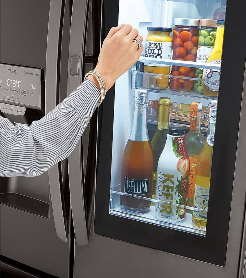 lg-refrigerator-LRFVC2406D-Hand-Knocking-Lit-Closeup.jpg