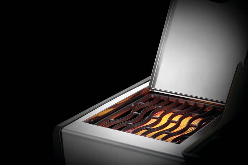 napoleon-rogue-xt-525-grill-RXT525SIBPSS-side-burner-glowing.jpg